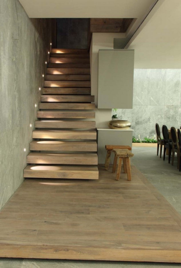 Wood Floors go above and beyond: walls, stairs and ceilings enjoy the natural touch with a wood finish